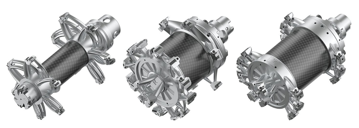 Design evolution: First-generation design (9.5kg) on the left, and latest tool design variants (less than 8kg) on the right for hassle free tool changing.