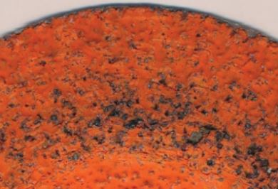 Figure 3: 13.5 lbs. of force was applied for 1:04 minutes and 64 grams were removed. Grain shedding is apparent from the excessive force, reducing life and causing wear to the machine and operator fatigue.