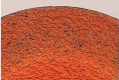 Figure 1: 9.5 PSI of force was applied for 2:45 minutes and removed 81 grams. Notice the even grain along the cutting edge. This indicates that the proper force and angle were used.