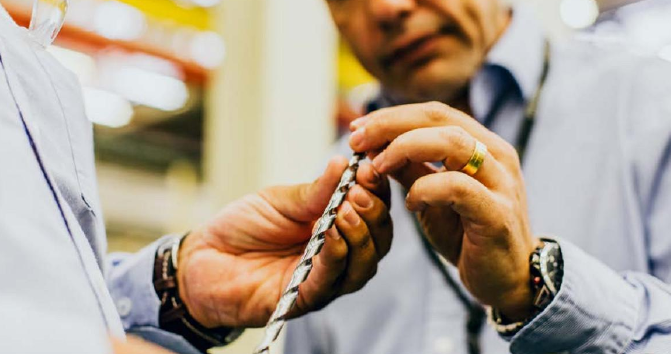 MWM Process Engineer Tarcisio Bottaccini inspects the 8 mm diameter ADO 30xD next generation high-performance carbide drill.