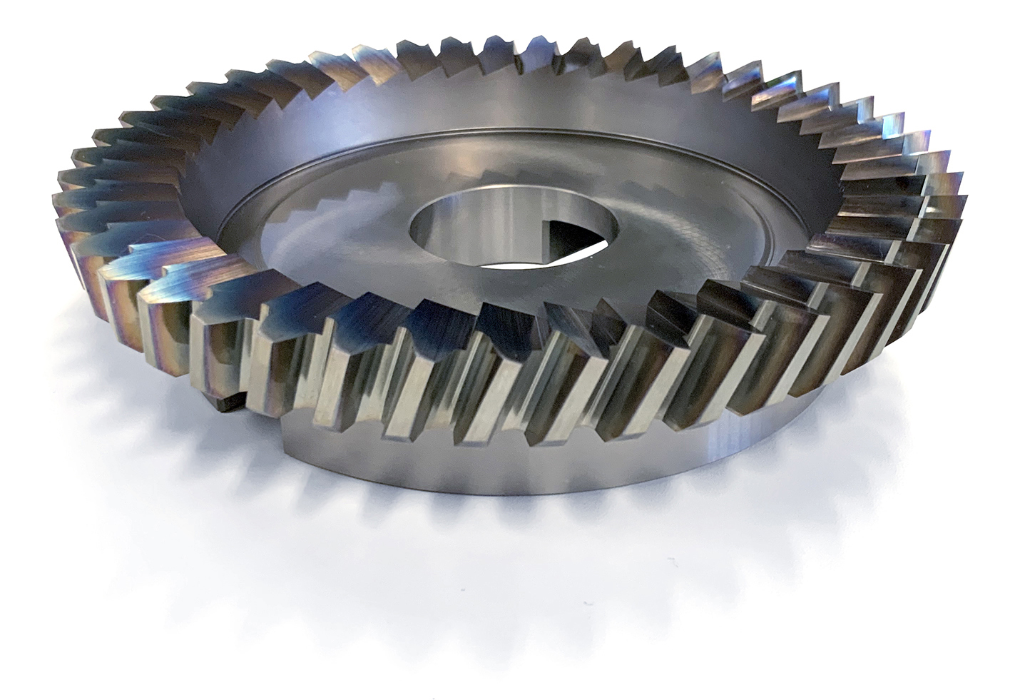 When used on CNC multitasking lathes, the skiving process provides greater flexibility than older dedicated machinery. (Image courtesy of OSG)