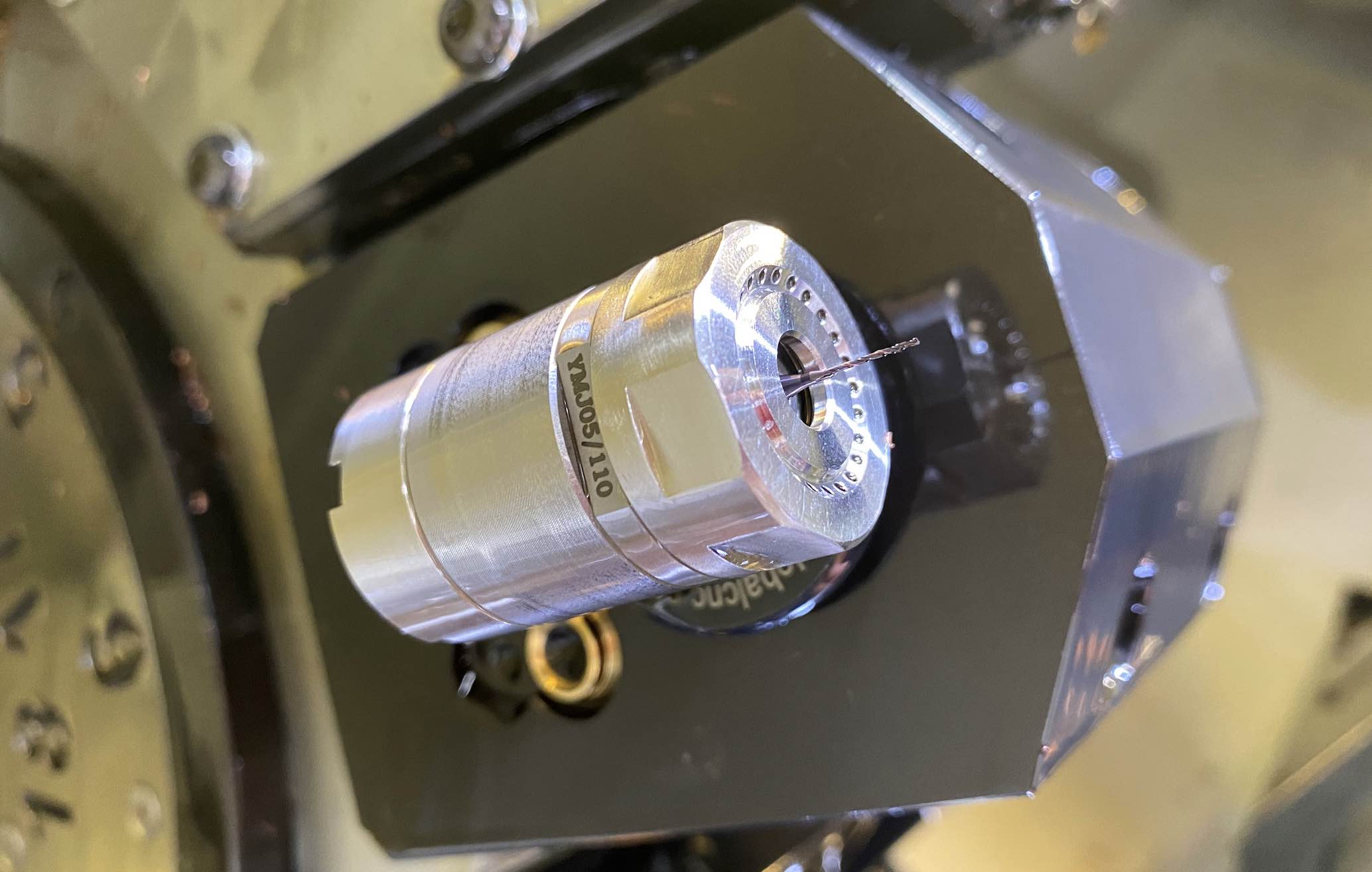 This CoolSpeed mini unit is installed in a CNC lathe and configured for cross-hole drilling, a cost-effective way to achieve what might otherwise require a secondary operation. (Image courtesy of WTO USA)